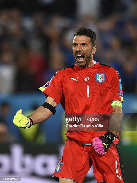 Gianluigi Buffon of Italy celebrates after his saves the penalty by Thomas Mueller of Germany at the penalty shootout during the UEFA EURO 2016...