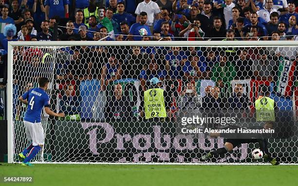 Manuel Neuer of Germany saves the penalty by Matteo Darmian of Italy at the penalty shootout during the UEFA EURO 2016 quarter final match between...