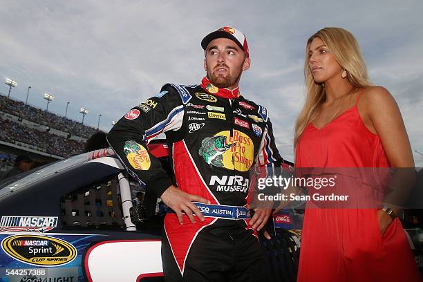 Austin Dillon, driver of the Bass Pro Shops/NRA Museum Chevrolet, stands on the grid with girlfriend Whitney Ward prior to the NASCAR Sprint Cup...