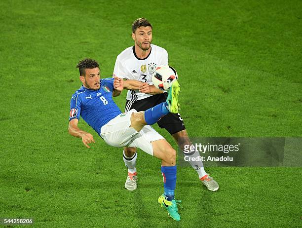 Jonas Hector of Germany in action against Alessandro Florenzi of Italy during the UEFA Euro 2016 quarter final match between Germany and Italy at...