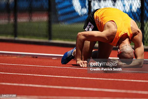 Jeremy Wariner falls to the track during the Men's 400 Meter Dash Semi-finals during the 2016 U.S. Olympic Track & Field Team Trials at Hayward Field...