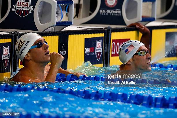 Tom Shields and Michael Phelps of the United States celebrate after competing in the final heat for the Men's 100 Meter Butterfly during Day Seven of...