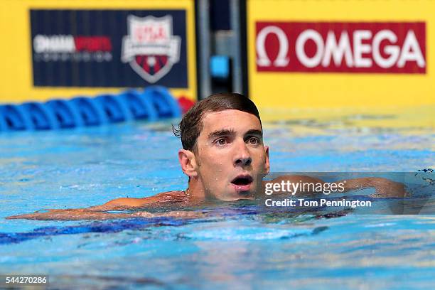 Michael Phelps of the United States celebrates after finishing first in the final heat for the Men's 100 Meter Butterfly during Day Seven of the 2016...