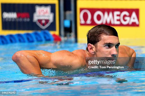 Michael Phelps of the United States celebrates after finishing first in the final heat for the Men's 100 Meter Butterfly during Day Seven of the 2016...