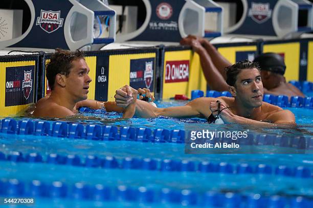 Tom Shields and Michael Phelps of the United States celebrate after competing in the final heat for the Men's 100 Meter Butterfly during Day Seven of...
