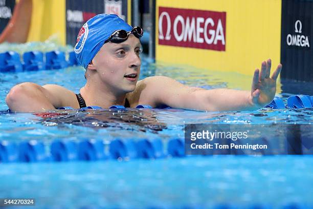 Katie Ledecky of the United States celebrates after finishing first in the final heat for the Women's 800 Meter Freestyle during Day Seven of the...