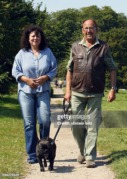 Herbert Koefer, Actor, Germany - with his wife Heike and dog August are going for a walk