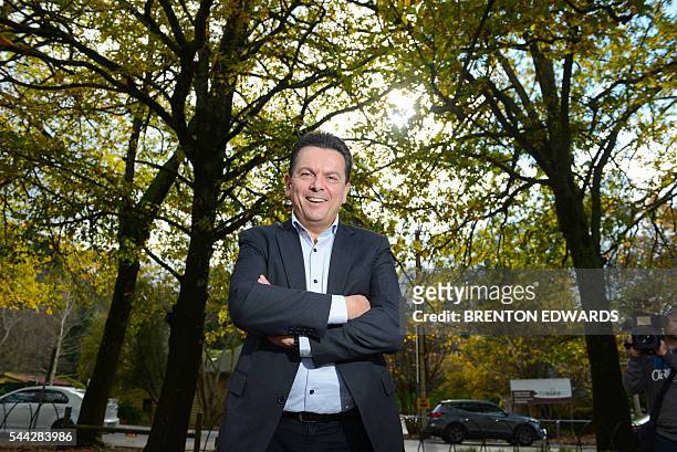 Nick Xenophon, leader of the Nick Xenophon Team political party, poses for photographs in the Adelaide Hills town of Stirling on July 3, 2016....