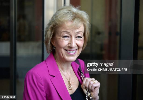 British Conservative party leadership candidate Andrea Leadsom stops to pose for photographers as she arrives at the BBC television centre in London...