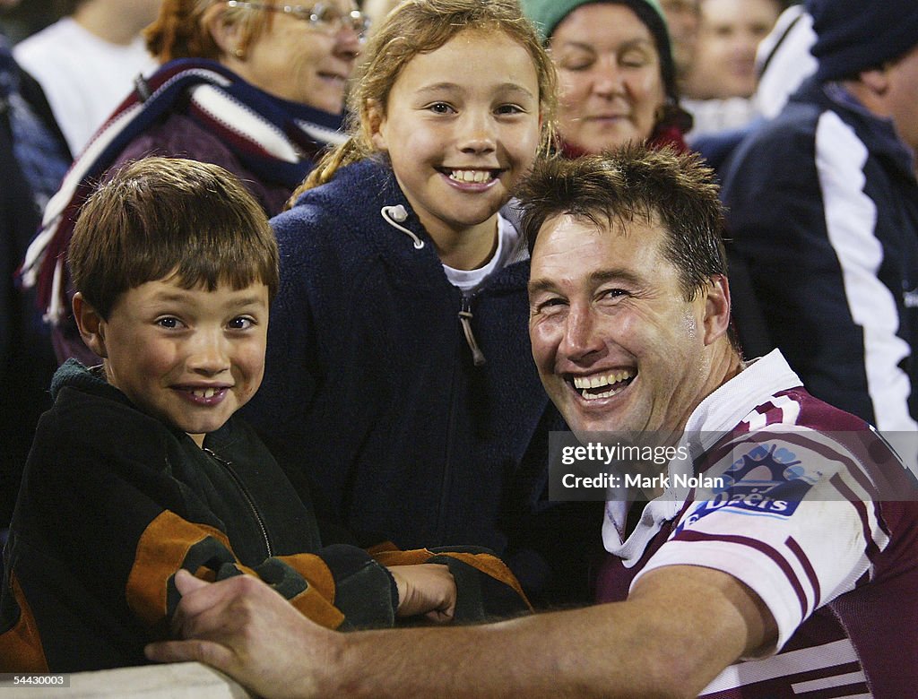 Nolan Stringer Terry Hill of the Eagles and his children are pictured after the ...