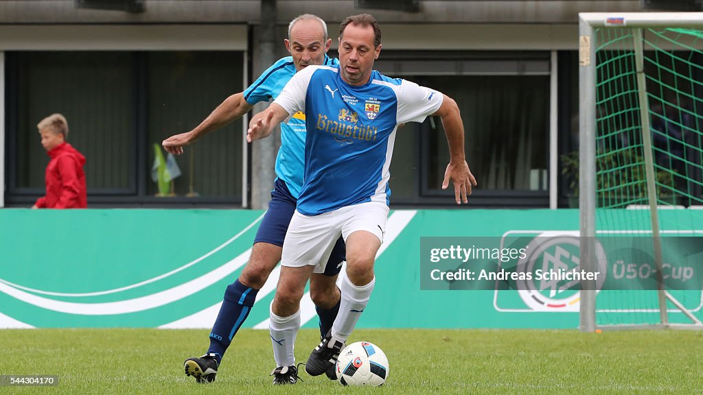 Jürgen Heselhaus of DJK Stenern challenges Thilo Albrecht of... News Photo Getty Images