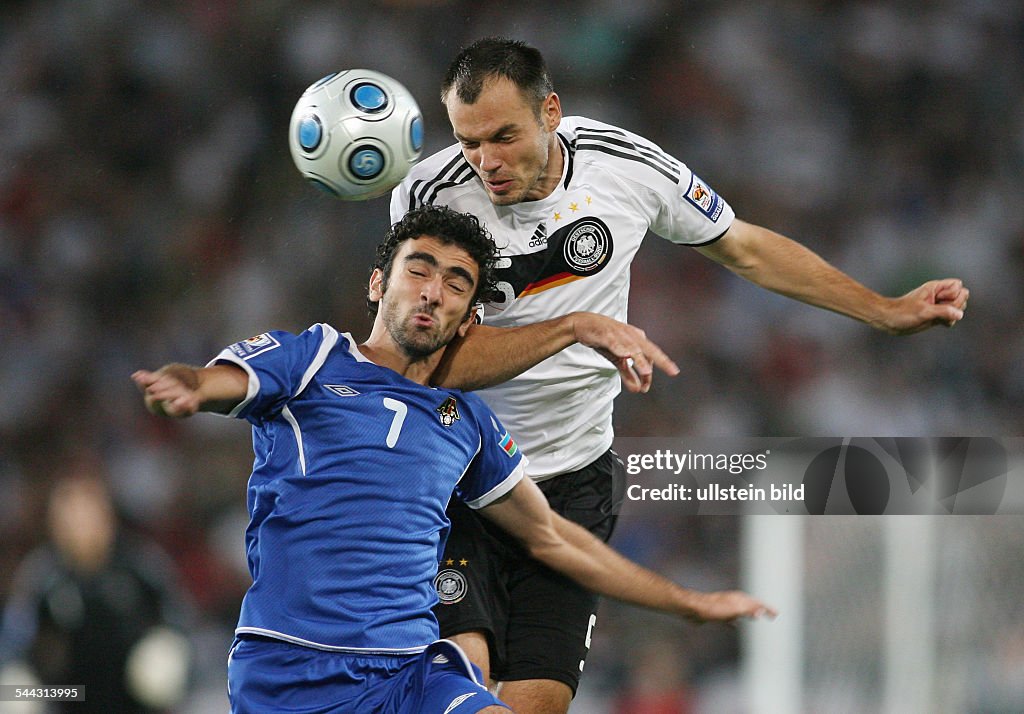 Federal Republic of Germany Lower Saxony Hannover - 2010 FIFA World Cup South Africa - Qualifier, Europe, Group 4 - Germany v Azerbaijan 4:0 - Germany's Heiko Westermann (back) battling for a header with Vagif Savadov