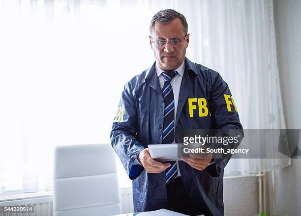 agente do fbi especiais - chefe da polícia imagens e fotografias de stock