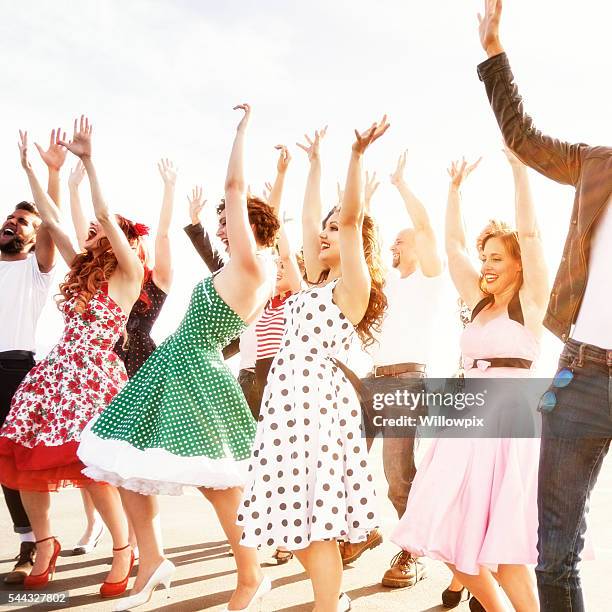 hands up dancers - fifties high school graduation dance - 1950 2016 stock pictures, royalty-free photos & images