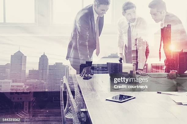 group of business people working with technology. - cgi blend stock pictures, royalty-free photos & images