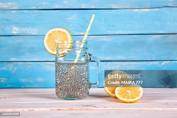 chia seeds energy drink on blue wood background - chiasamen stock-fotos und bilder