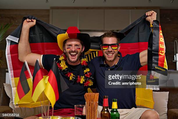 zwei deutsche fußball-fans - german culture stock-fotos und bilder