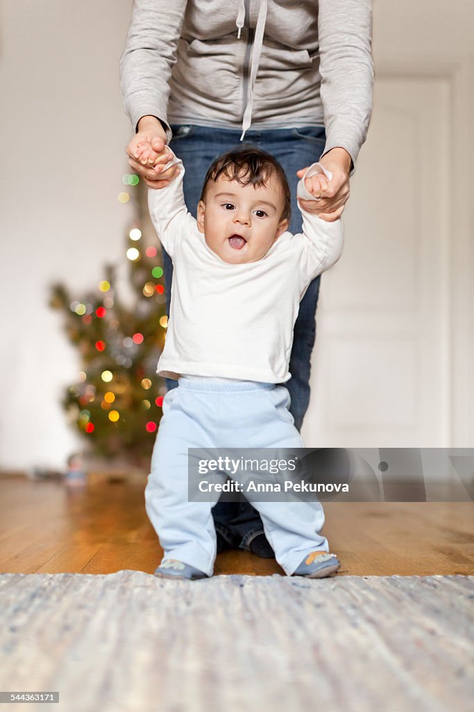 Baby boy learning to walk