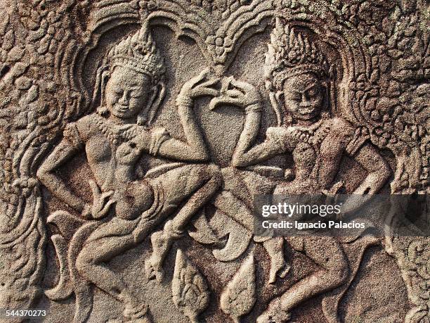 detail of nymphs apsaras in angkor wat temple - cambodia pattern stock pictures, royalty-free photos & images