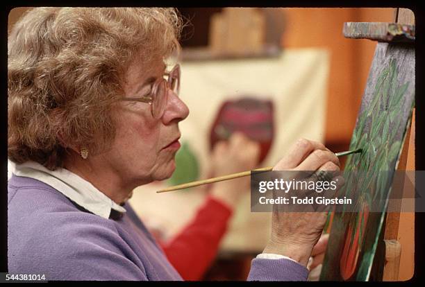 Woman Painting at a Lyman Allyn Museum Art Class