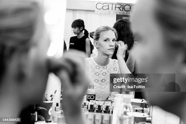 Model is seen ahead of the Malaikaraiss defilee during the Der Berliner Mode Salon Spring/Summer 2017 at Kronprinzenpalais on June 28, 2016 in...