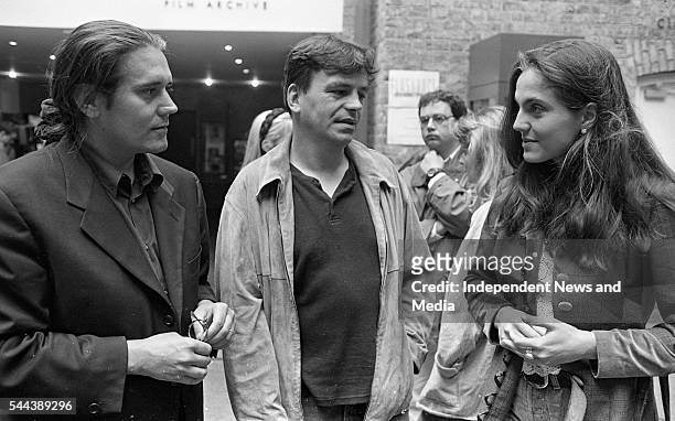 Film producer Steve Woolley and director, producer, and writer Neil Jordan speak with an unidentified woman at the Gregory Peck Script Writing Summer...