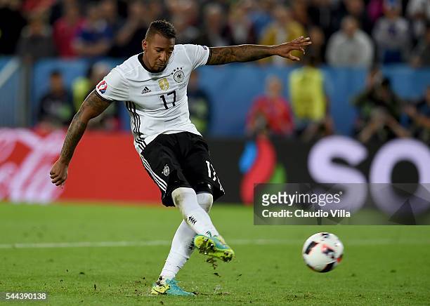 Jerome Boateng of Germany scores at the penalty shootout during the UEFA EURO 2016 quarter final match between Germany and Italy at Stade Matmut...