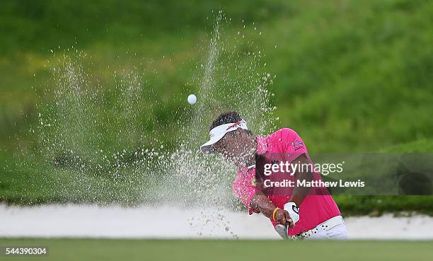 Thongchai Jaidee of Thailand plays out of a bunker on the 14th hole during day four of the 100th Open de France at Le Golf National on July 3, 2016...