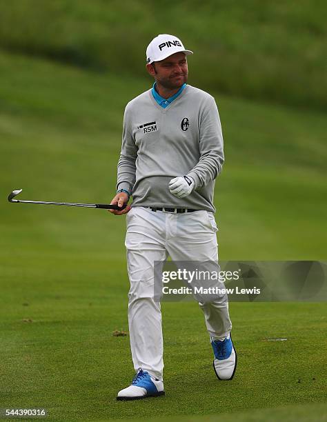 Andy Sullivan of England plays a shot from the 17th fairway during day four of the 100th Open de France at Le Golf National on July 3, 2016 in Paris,...