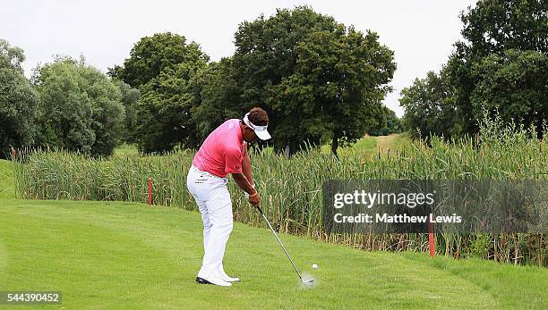Thongchai Jaidee of Thailand plays out of the rough on the 13th hole during day four of the 100th Open de France at Le Golf National on July 3, 2016...