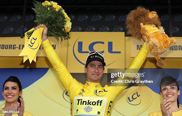 Peter Sagan of Slovakia riding for Tinkoff celebrates after winning stage two and taking the yellow leader's jersey during stage two of the 2016 Le...