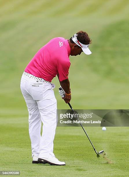Thongchai Jaidee of Thailand plays a shot from the fairway during day four of the 100th Open de France at Le Golf National on July 3, 2016 in Paris,...