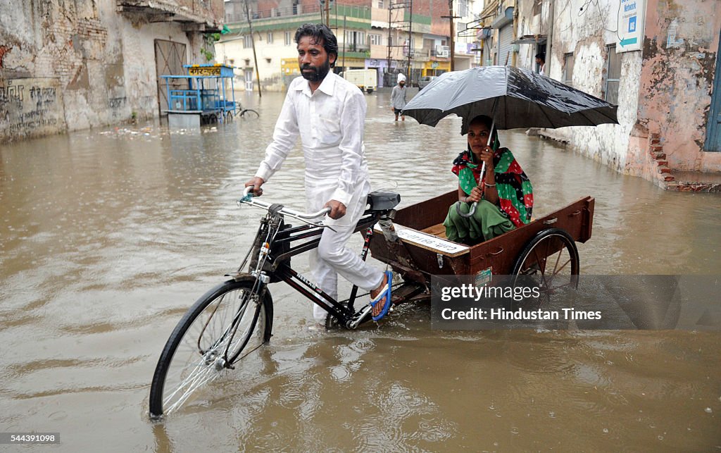 Heavy Rains In Punjab Bring Relief From Sultry Weather