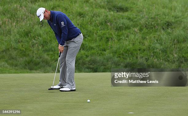Bernd Wiesberger of Austria makes a putt during day four of the 100th Open de France at Le Golf National on July 3, 2016 in Paris, France.