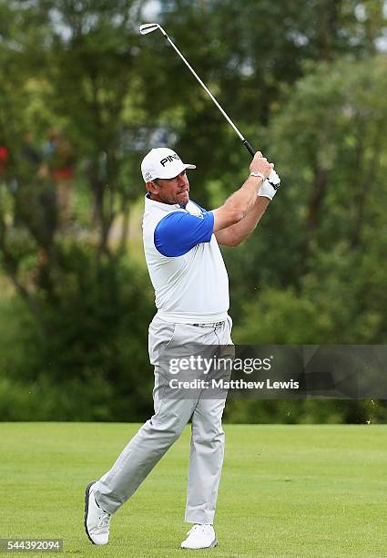 Lee Westwood of England plays a shot from the 1st fairway during day four of the 100th Open de France at Le Golf National on July 3, 2016 in Paris,...