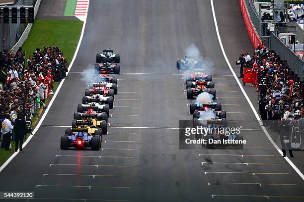 The drivers begin their parade lap before the Formula One Grand Prix of Austria at Red Bull Ring the home of Red Bull Racing on July 3, 2016 in...