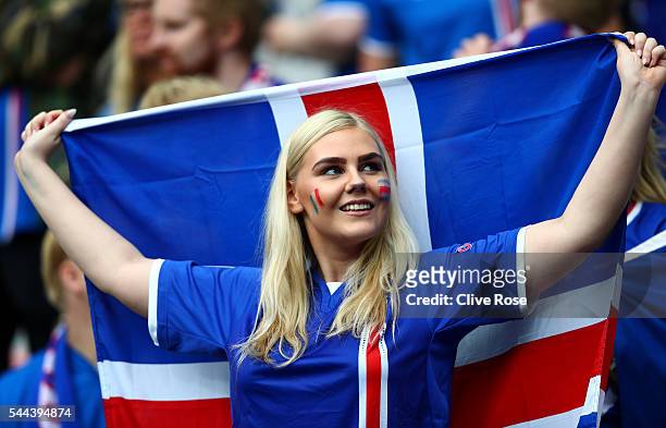 An Iceland supporter enjoys the atmosphere prior to the UEFA EURO 2016 quarter final match between France and Iceland at Stade de France on July 3,...