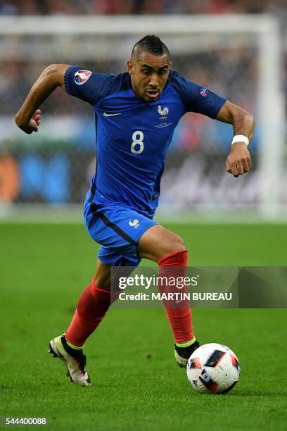 France's forward Dimitri Payet controls the ball during the Euro 2016 quarter-final football match between France and Iceland at the Stade de France...