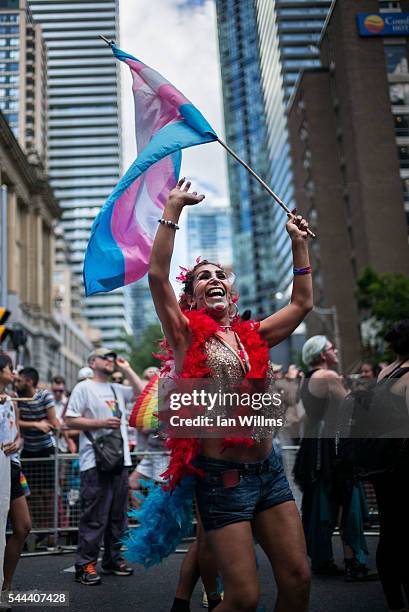 Tanaz Mehraban dances with joy during the annual Pride Festival parade, at the annual Pride Festival parade, July 3, 2016 in Toronto, Ontario,...