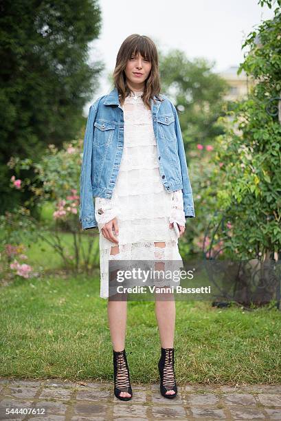 Designer Anna K poses wearing an Anna K dress before the Ulyana Sergeenko show at Galerie de la Mineralogie during Paris Fashion Week Haute Couture...