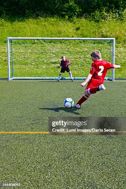 boys at soccer training, exercising penalty kick, munich, bavaria, germany - scoring soccer stock pictures, royalty-free photos & images