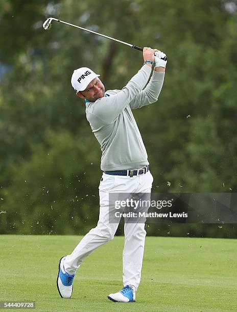 Andy Sullivan of England plays a shot from the 1st fairway during day four of the 100th Open de France at Le Golf National on July 3, 2016 in Paris,...