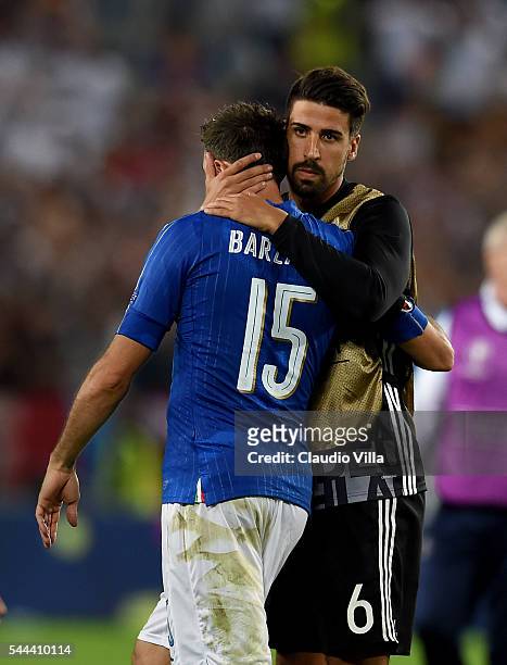 Sami Khedira of Germany and Andrea Barzagli of Italy at the end of the UEFA Euro 2016 quarter final match between Germany and Italy at Stade Matmut...