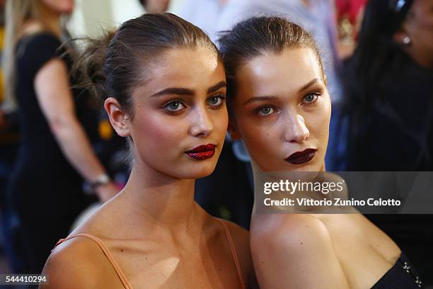 Taylor Marie Hill and Bella Hadid prepare backstage prior to the Atelier Versace Haute Couture Fall/Winter 2016-2017 show as part of Paris Fashion...