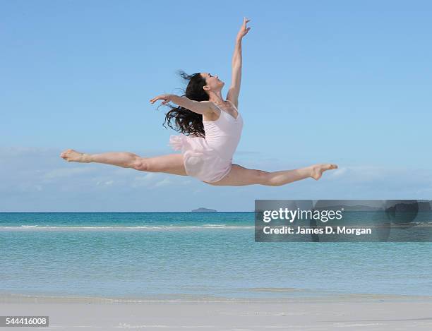 Four dancers from The Australian Ballet rehearsing their moves on June 11, 2010 in Whitehaven Beach, Queensland. The Australian Ballet performance is...