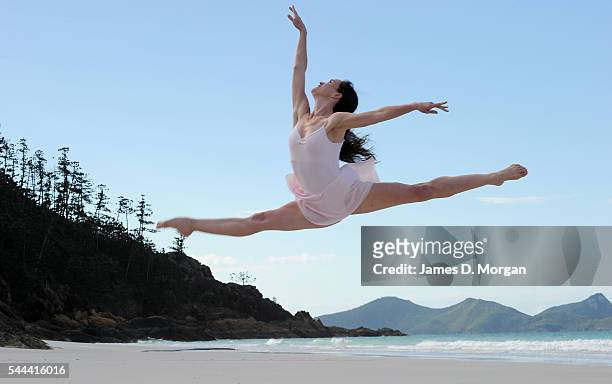 Four dancers from The Australian Ballet rehearsing their moves on June 11, 2010 in Whitehaven Beach, Queensland. The Australian Ballet performance is...