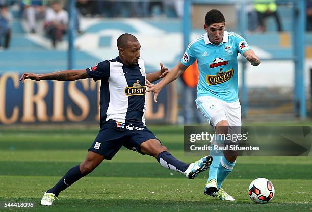 Santiago Silva of Sporting Cristal struggles for the ball with Luis Ramirez of Alianza Lima during a match between Sporting Cristal and Alianza Lima...