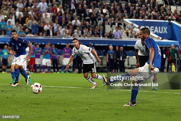 Leonardo Bonucci of Italy scores the equaliser from the penalty spot during the UEFA Euro 2016 Quarter Final match between Germany and Italy at...