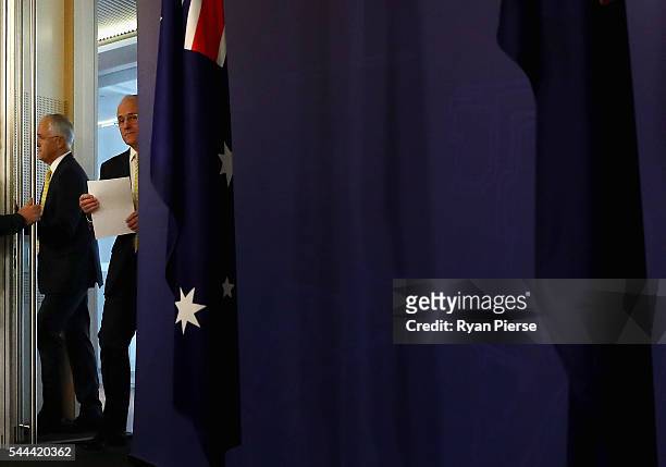 Prime Minister Malcolm Turnbull arrives for a press conference at the Commonwealth Parliament Offices on July 3, 2016 in Sydney, Australia. The...