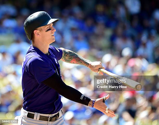 Brandon Barnes of the Colorado Rockies reacts to his strikeout during the eighth inning against the Los Angeles Dodgers at Dodger Stadium on July 3,...